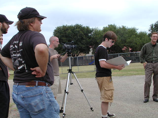 Eric Lundquist stands by at filming of Armadillo News