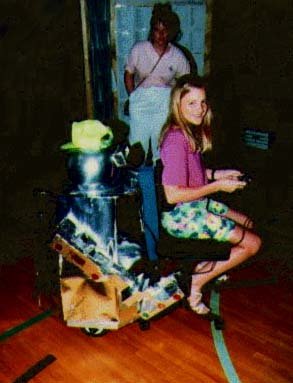 Wan Yik Lee's Rover takes another happy RoboFest 4 attendee for a ride. Notice the Nintendo controller?